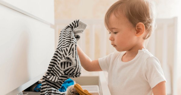 Teacher helping young children develop problem-solving skills